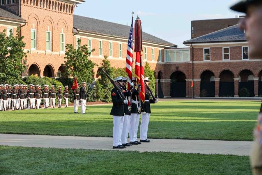 Marines with the U.S. Marine Corps Color Guard prepare to present the U.S. Flag during a retirement ceremony at Marine Barracks Washington D.C.